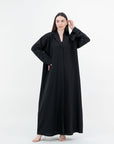 A sleek plain abaya with a collar design, available in black, grey, beige, deep green, and dark brown, crafted for elegance and comfort in sizes 50-60. Includes a complimentary hijab.
