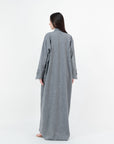 A sleek plain abaya with a collar design, available in black, grey, beige, deep green, and dark brown, crafted for elegance and comfort in sizes 50-60. Includes a complimentary hijab.