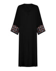 Black Liana Abaya with hand-sewn silver beads in a leaf and embroidery design pattern on the arms. Light pink, blue, and purple threads add color to the embroidery. Comes with a matching black hijab and popper buttons for closure.