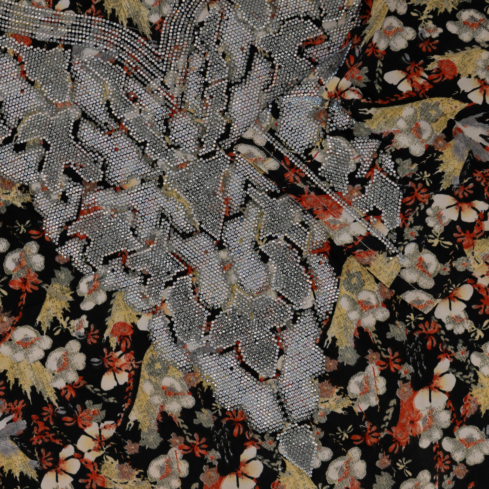 The Mina Mukhawar Dress features floral branch patterns, a satin finish, and comes with a belt in vibrant color options, available in sizes 52-58. Perfect for elegant occasions.