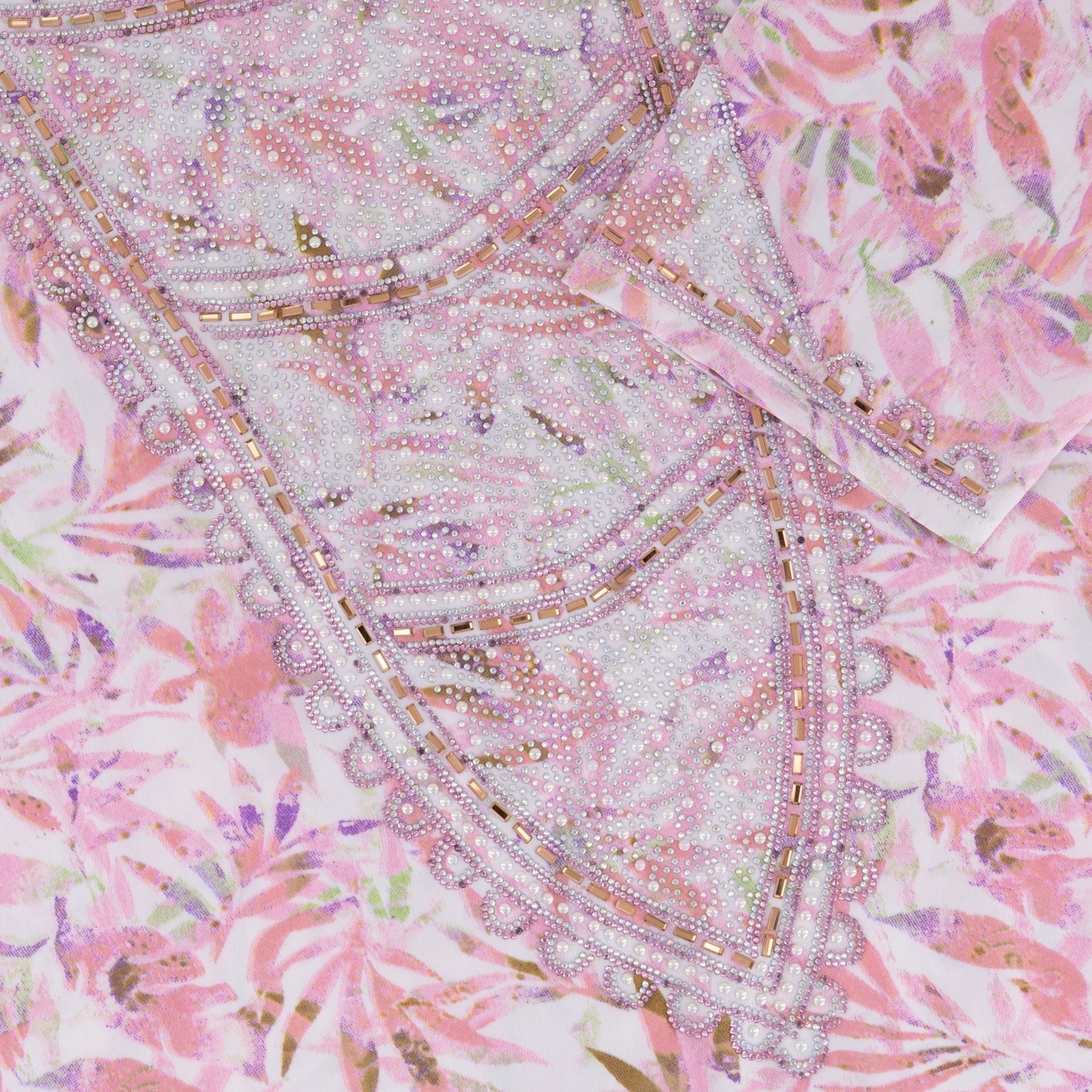 The NIHAL Mukhawar Dress, crafted from 100% satin with a floral pattern and waist-accentuating belt, exudes elegance. Available in five stunning colors and sizes 52–58, it’s perfect for any occasion.