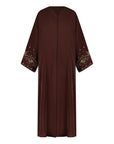 Reema Abaya available in Black, Vanilla, and Chocolate Brown with golden and silver beaded sleeves in a floral and leafy design. Made from crepe fabric with popper buttons, available in sizes 50-60. Includes a matching hijab.