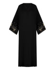 Reema Abaya available in Black, Vanilla, and Chocolate Brown with golden and silver beaded sleeves in a floral and leafy design. Made from crepe fabric with popper buttons, available in sizes 50-60. Includes a matching hijab.