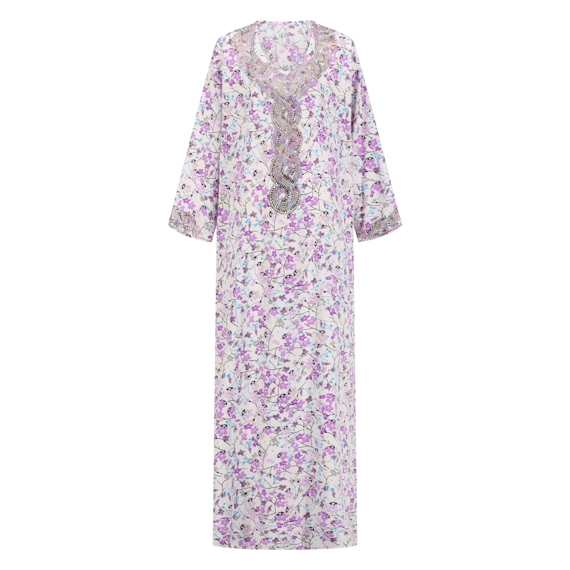 The TALIA Mukhawar Dress features floral and leafy prints with a satin finish, available in vibrant colors and sizes 52-58, perfect for any elegant occasion.