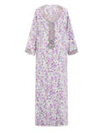 The TALIA Mukhawar Dress features floral and leafy prints with a satin finish, available in vibrant colors and sizes 52-58, perfect for any elegant occasion.