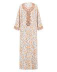 The TALIA Mukhawar Dress features floral and leafy prints with a satin finish, available in vibrant colors and sizes 52-58, perfect for any elegant occasion.