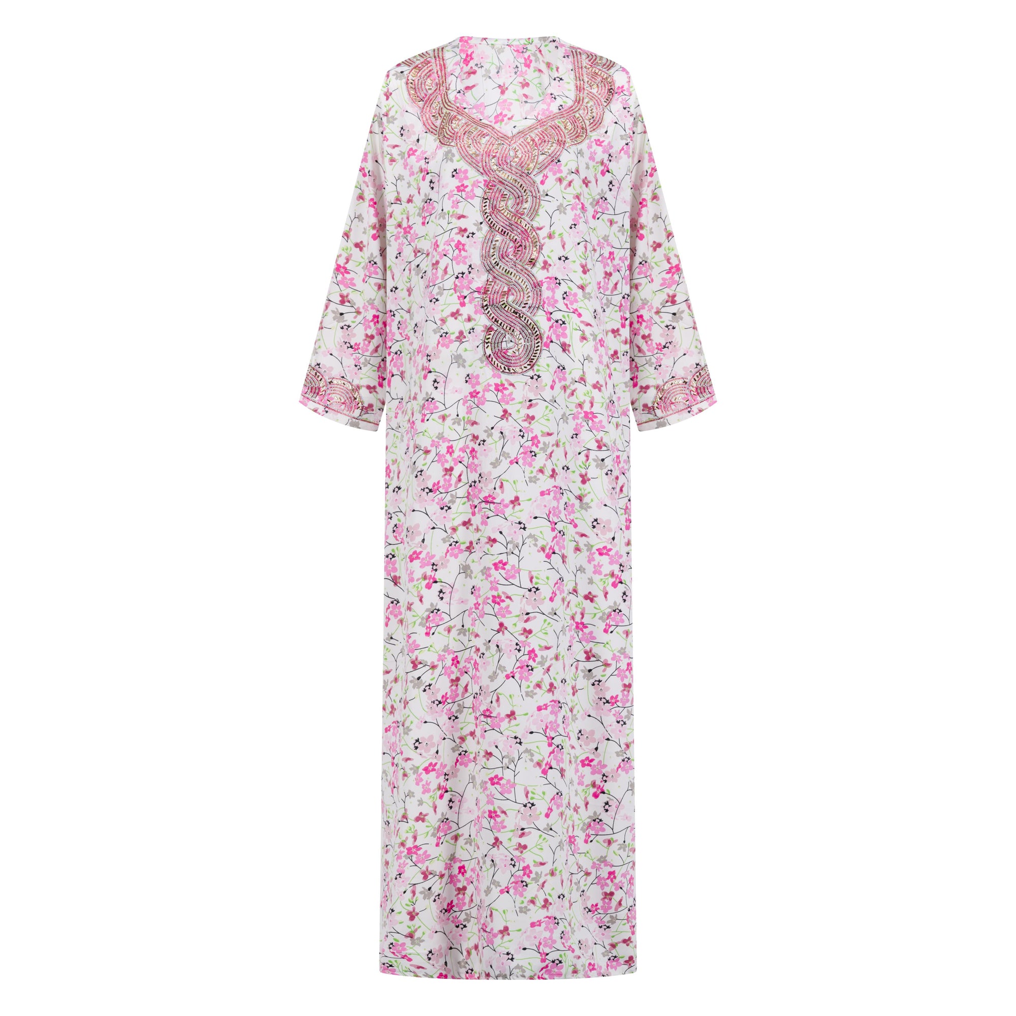 The TALIA Mukhawar Dress features floral and leafy prints with a satin finish, available in vibrant colors and sizes 52-58, perfect for any elegant occasion.