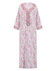 The TALIA Mukhawar Dress features floral and leafy prints with a satin finish, available in vibrant colors and sizes 52-58, perfect for any elegant occasion.