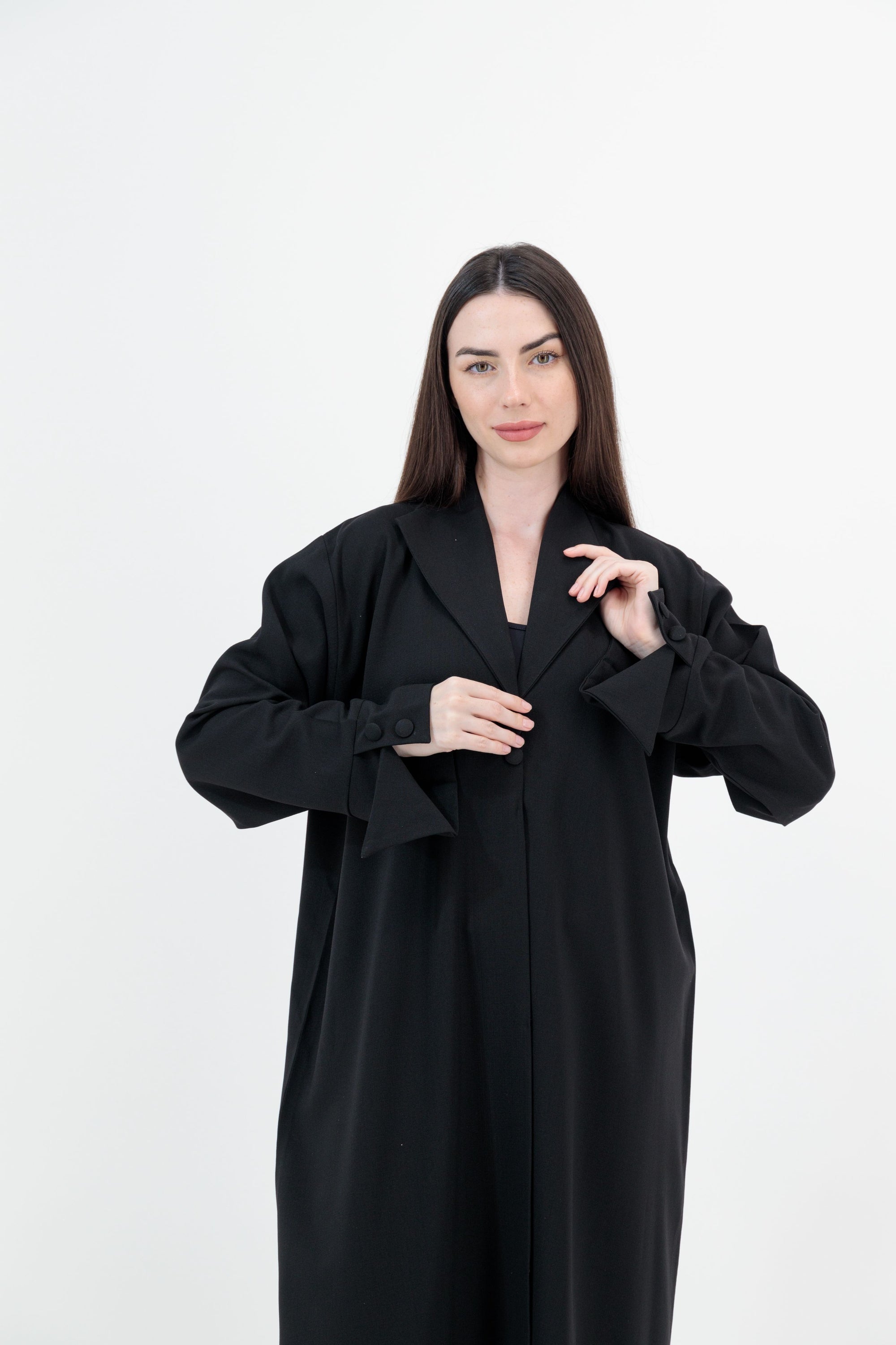 
A sleek plain abaya with a collar design, available in black, grey, beige, deep green, and dark brown, crafted for elegance and comfort in sizes 50-60. Includes a complimentary hijab.